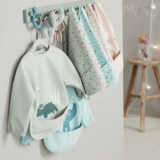 Done By Deer Sleeved Pocket Bib - Lalee Sand