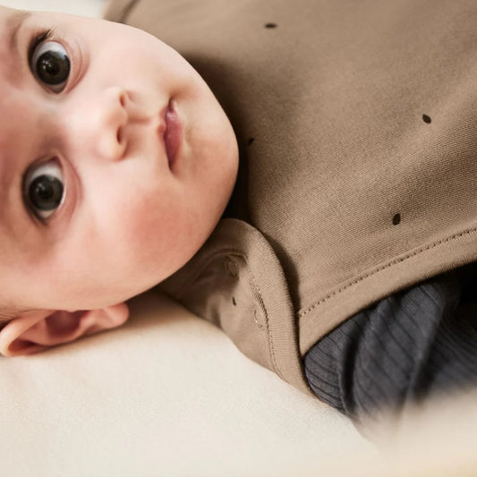 The Little Green Sheep Organic Quilted Baby Sleeping Bag in Cocoa with Ebony - 1.0 Tog