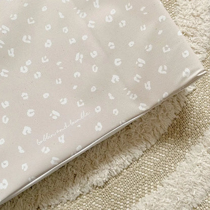 Bobbin and Bumble Anti-Roll Wedge Baby Changing Mat - Sand Animal Print